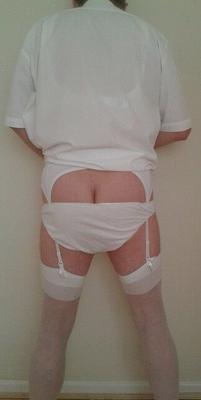 White shirt, white bra, panties, stockings & suspenders strip!