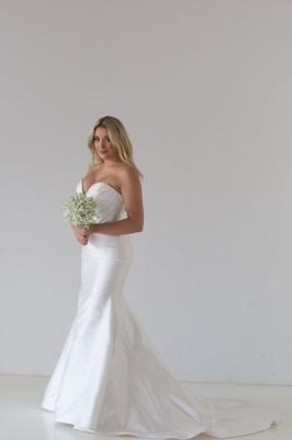Blonde bride with butt tattoo