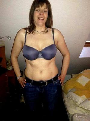 Unaware german housewife Striptease