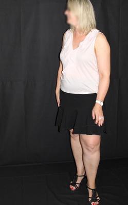 chubby mature loses a bet and has to pose in slutty outfit