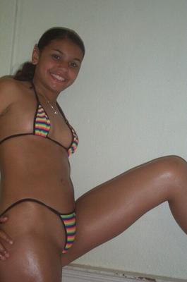 Gorgeous teenie in a teeny bikini
