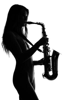 Music is nude, sensual women playing an instrument