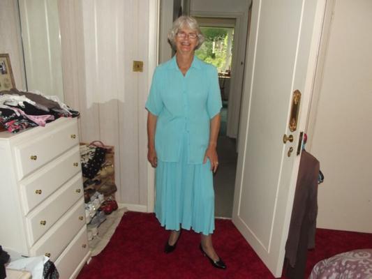 blue top and skirt with seamed stockings