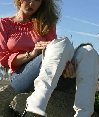 Women in White/Gold Boots 3