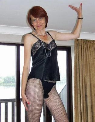 Slim, mature, small tit floating home UK wife