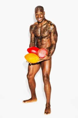 Black man holding his large balls
