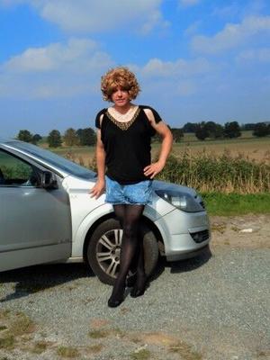 CD Nicola in Black Top and Denim Shorts.