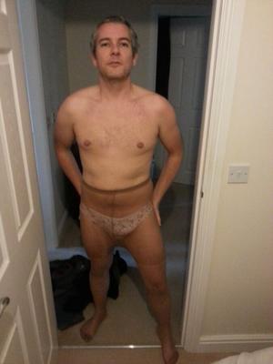 Sissy in pantyhose sucks cock