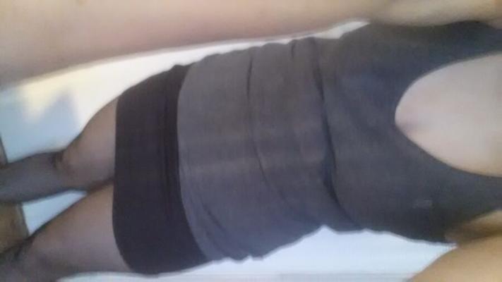 Jupe haute avec bas nylons noirs