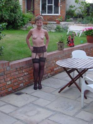 Tigerpuss sexy slut posing in the office in stockings