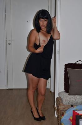 Hot French MILF in a black wig