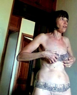 Undressing at the Kitchen Window
