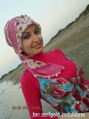 Hübsche Turbanli-türkische Mutter, ein paar Bilder, sie ist schwanger