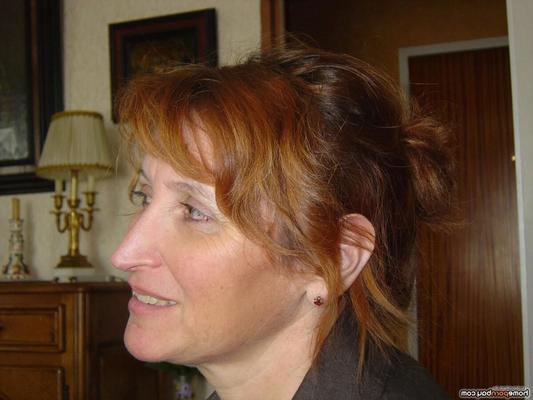 MILF rousse au fil des années toujours sexy