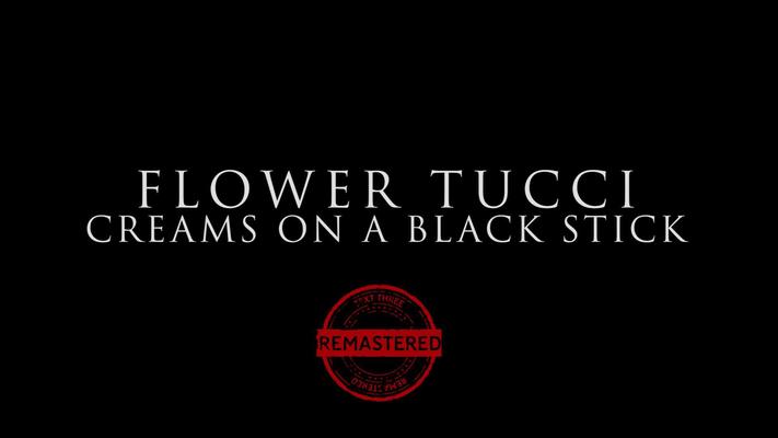 Blumentucci -Cremes auf einem schwarzen Stock